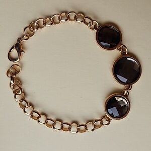 Gold-tone chain link bracelet with faceted stones 8"